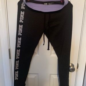 Pink. Yoga pants. Dark gray/black with purple band and white lettering. Medium